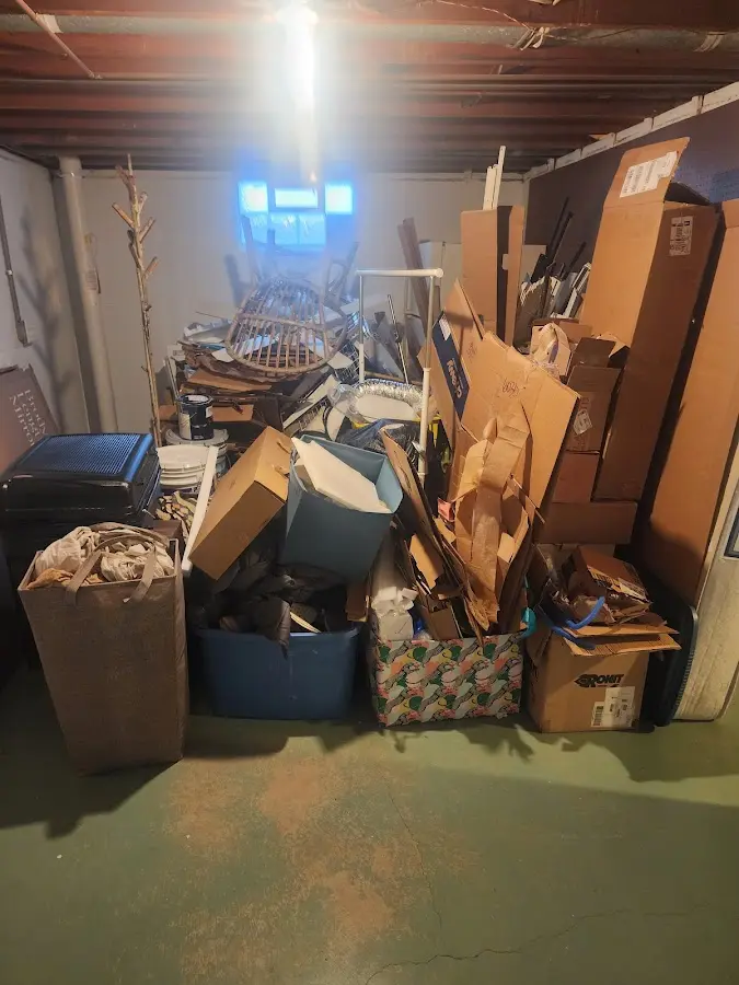 Roll-off dumpster container at job site for 2 Yard Dumpster Rental in Westland